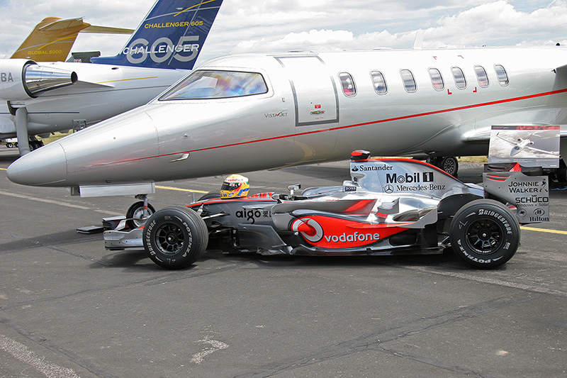 Bombardier Lear Jet 40XR, VistaJet<br>McLaren Mercedes MP4-23